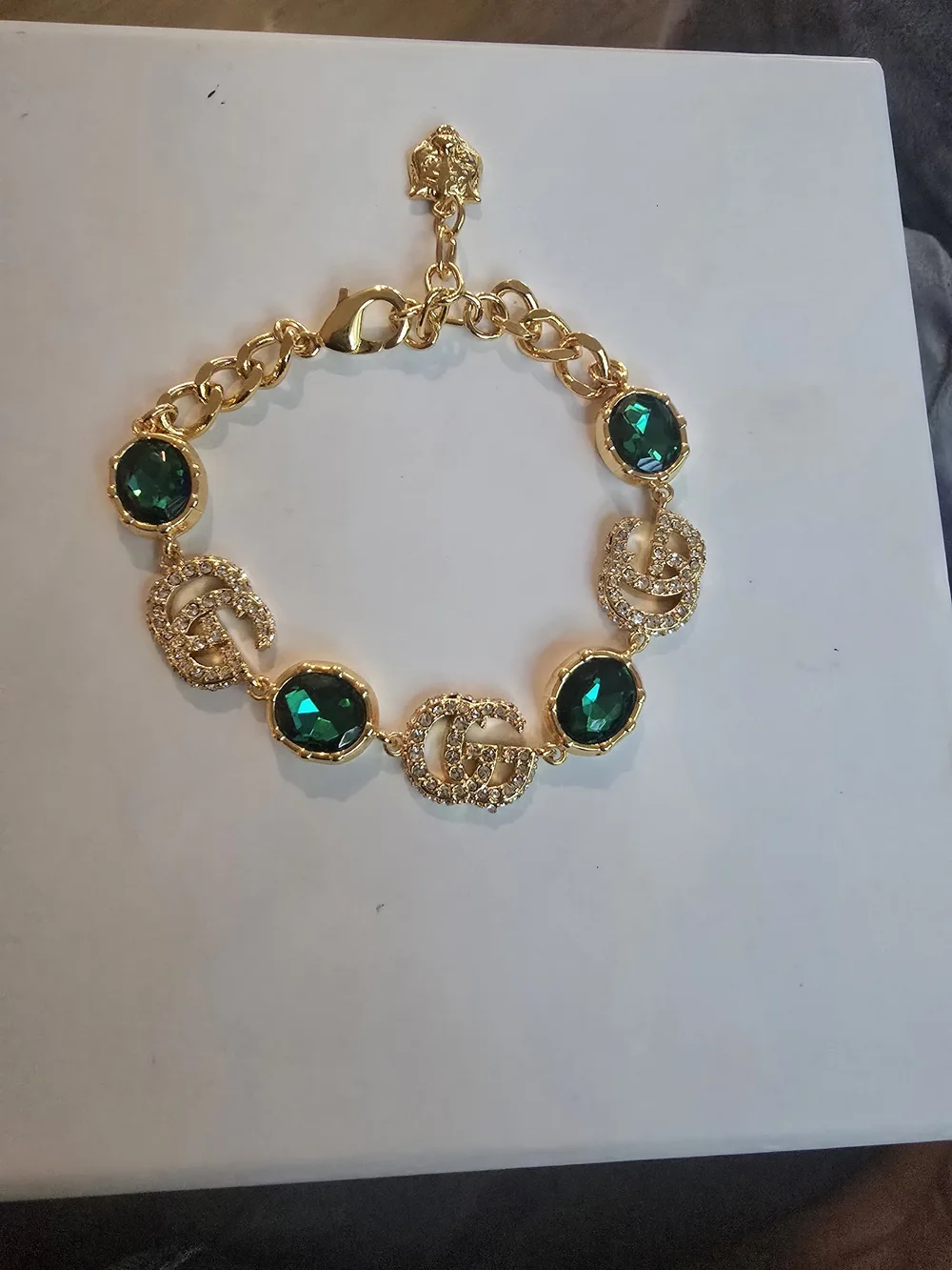 Gucci 18kgp GG Gold-Tone Bracelet with Emerald Green Crystal Accents